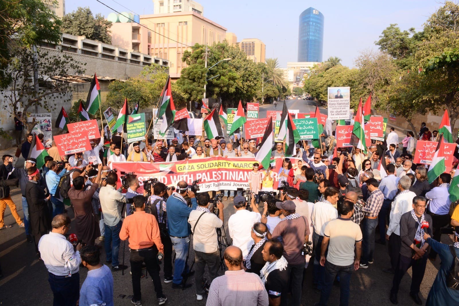 protesters march in Karachi